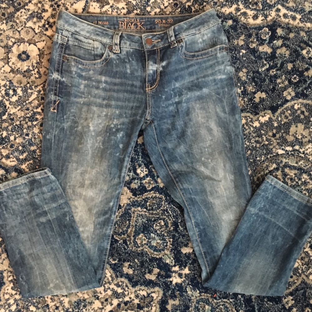 Distressed Straight Legged Jeans